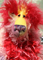 Twinkle has beautiful, sparkling, hand painted glass eyes (painted to match her colours) with hand-coloured eyelids, a stunning nose embroidered from individual threads to match her colouring and a beaming smile, her tummy and the backs of her ears are a long, soft, fluffy faux fur in red tipped with pale pink, the top of her face is a long, curly mohair hand-dyed a sunny yellow and the top of her head is a long, fluffy red mohair