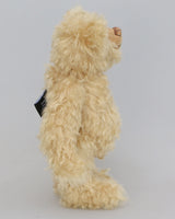 Duncan a one of a kind, traditional mohair artist teddy bear by Barbara-Ann Bears. He stands 11 inches (28cm) tall and is 8 inches (20cm) sitting. He is made from a dense wavy blonde German mohair with wool felt paw pads.  Walter is from the design we used to make Marigold's teddy bear for the TV series Downton 
