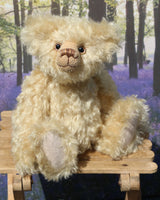 Duncan a one of a kind, traditional mohair artist teddy bear by Barbara-Ann Bears. He stands 11 inches (28cm) tall and is 8 inches (20cm) sitting. He is made from a dense wavy blonde German mohair with wool felt paw pads.  Walter is from the design we used to make Marigold's teddy bear for the TV series Downton 