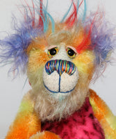 Wilbur Chuckleton has big, beautiful, sparkling, hand painted glass eyes with eyelids, a wonderful nose embroidered from individual threads to match his colouring and a charming smile