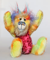 Wilbur Chuckleton is not the most sensible of bears, a comical one of a kind artist bear in hand dyed mohair and faux fur by Barbara Ann Bears, he stands 10.5 inches/33 cm tall and is 8 inches (20 cm) sitting.  Wilbur Chuckleton is a sweet and colourful chap, he was designed to put a smile on your face