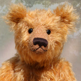 William is an elegant and charming, classical, one of a kind, traditional artist teddy bear by Barbara Ann Bears, he stands 14 inches/36cm tall and is 10 inches/26 cm sitting. William is made from a beautiful, slightly sparse, fairly long, feathery, strawberry blonde coloured German mohair