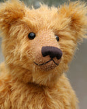 William is an elegant and charming, classical, one of a kind, traditional artist teddy bear by Barbara Ann Bears, he stands 14 inches/36cm tall and is 10 inches/26 cm sitting. William is made from a beautiful, slightly sparse, fairly long, feathery, strawberry blonde coloured German mohair