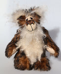 Woody is a very friendly and cuddly one of a kind, artist bear by Barbara-Ann Bears in wonderful fluffy tipped mohair Woody stands 9 inches(23 cm) tall and is 7 inches(18 cm) sitting.   Woody is a very happy and cuddly teddy bear. He's so fluffy that he could almost trip over his own fur