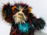 Yolaf Yeti-Boogie, an exceedingly vibrant, happy and colourful, one of a kind, artist yeti-bear in faux fur & mohair by Barbara-Ann Bears Yolaf Yeti-Boogie stands 13.5 inches (34 cm) tall and is 11 inches (28 cm) sitting.
