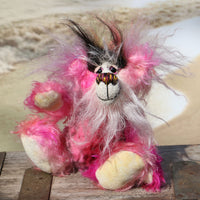 Yummy YumYum is a comical, fabulously pink, one of a kind, artist bear in beautiful hand dyed mohair and faux fur by Barbara-Ann Bears. Yummy YumYum stands 7.5 inches (19 cm) tall and is 6 inches (15 cm) sitting, this doesn't include her wild hair which adds another 3 inches (7.5 cm) to those measurements.