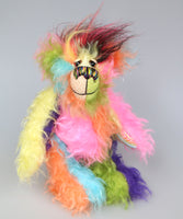 Zoiks! is a rather colourful and comical one of a kind artist bear in beautiful, fluffy hand dyed mohair and faux fur by Barbara Ann Bears. Zoiks! stands 10.5 inches( 33 cm) tall and is 8 inches (20 cm) sitting, this doesn't include his plumes of hair which add another 3 inches/ 7.5cm.